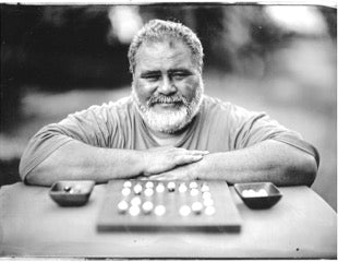 black and white picture of john kaohelaulii