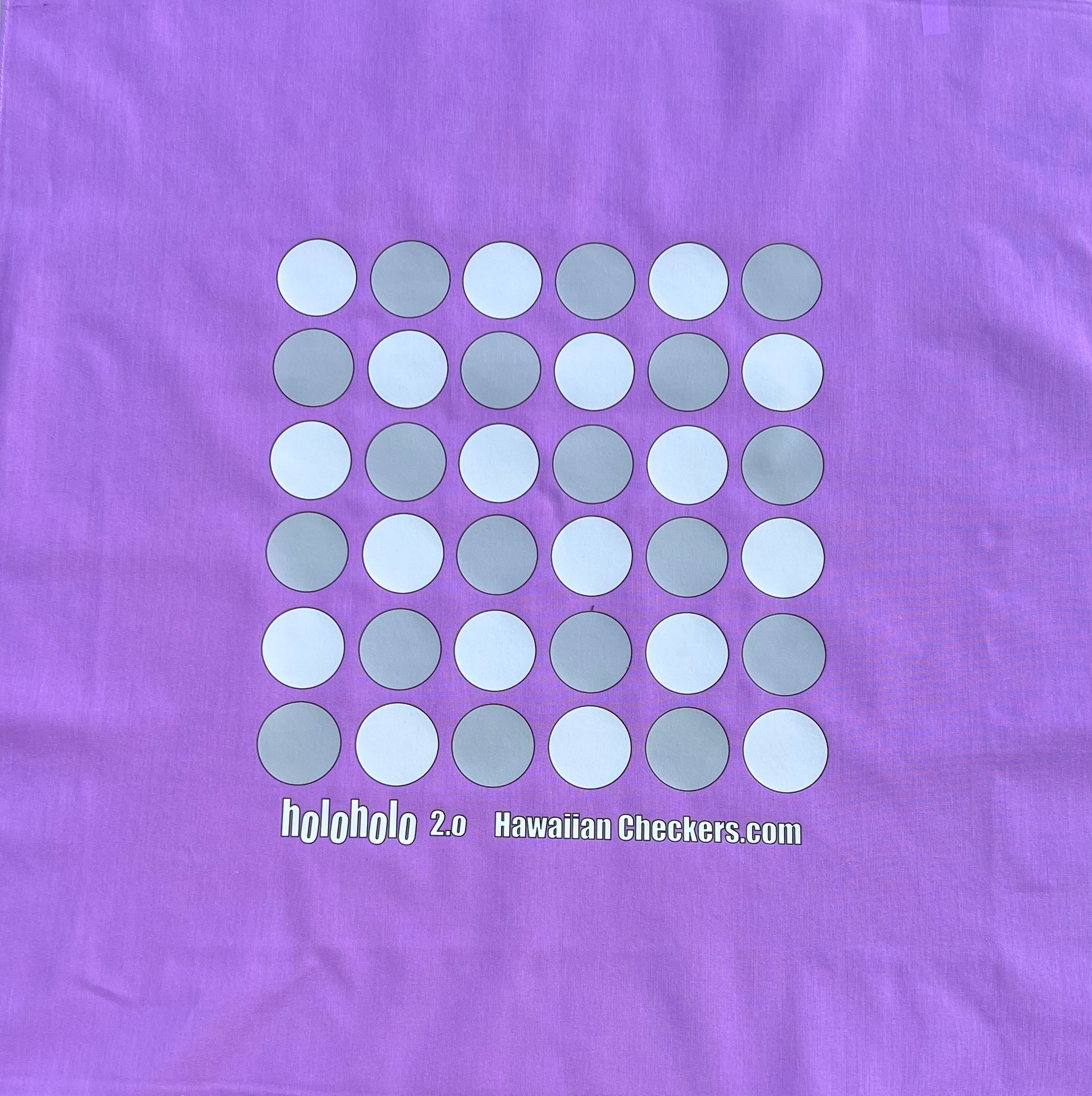 Purple fabric with a pattern of white and gray circles and text 'holoholo 2.0 Hawaiian Checkers.com'.