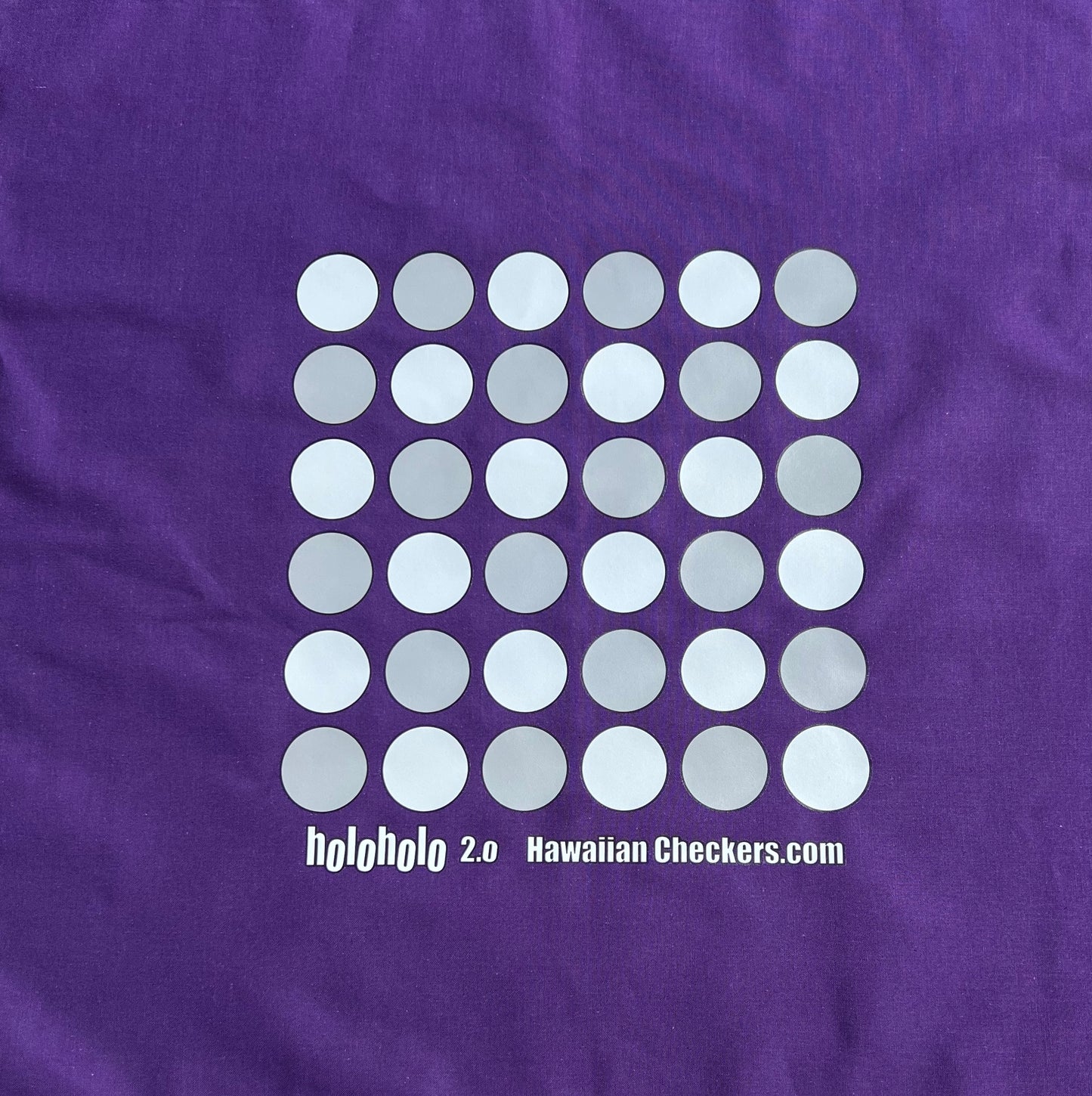 Purple fabric with a pattern of white and gray circles and text 'holoholo 2.0 Hawaiian Checkers.com'.